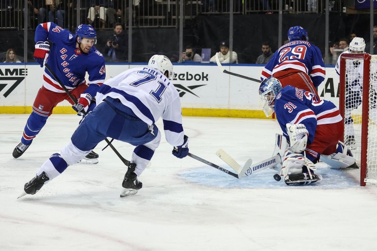 Nov 29, 2025; New York, New York, USA;  New York Rangers goaltender Igor Shesterkin (31) defends against a shot on goal attempt from Tampa Bay Lightning center Anthony Cirelli (71) in the first period at Madison Square Garden. Mandatory Credit: Wendell Cruz-Imagn Images