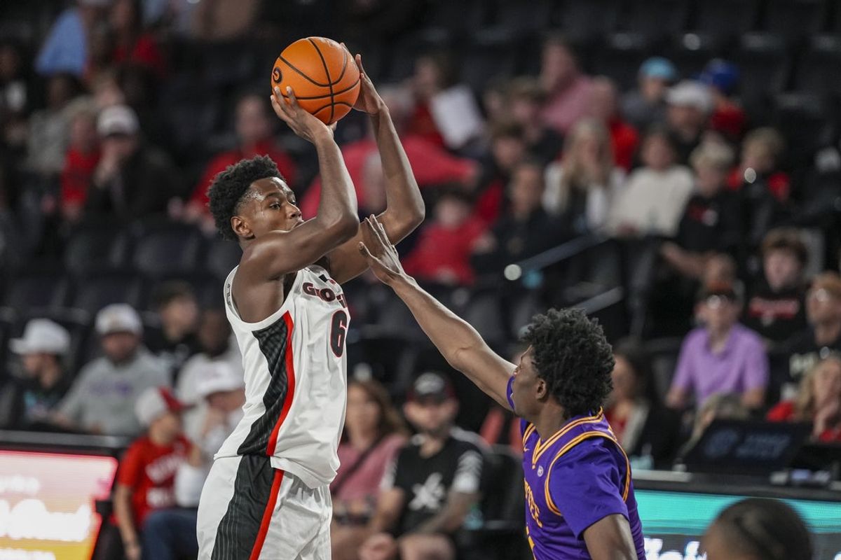 Nov 29, 2025; Athens, Georgia, USA; Georgia Bulldogs forward Kanon Catchings (6) shoots over Tennessee Tech Golden Eagles forward Mekhi Turner (4) during the second half at Stegeman Coliseum. Mandatory Credit: Dale Zanine-Imagn Images