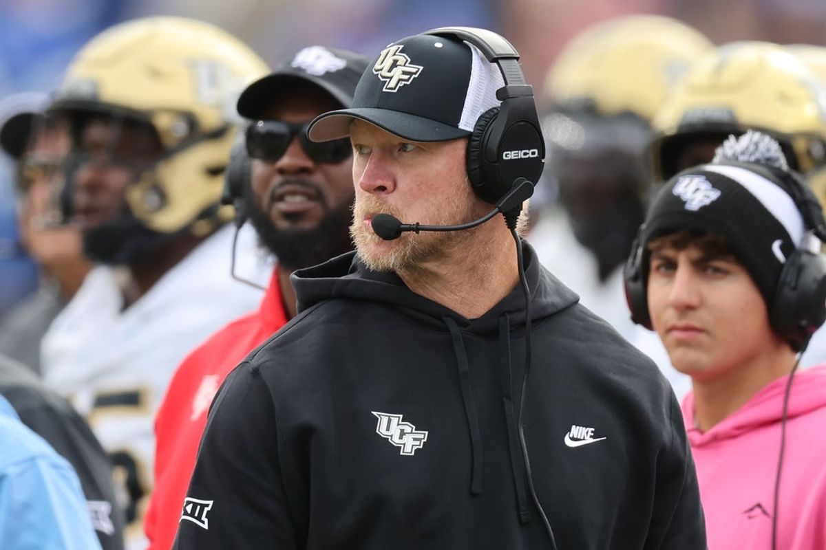 Nov 29, 2025; Provo, Utah, USA; UCF Knights head coach Scott Frost watches play against the BYU Cougars during the second half at LaVell Edwards Stadium. Mandatory Credit: Rob Gray-Imagn Images