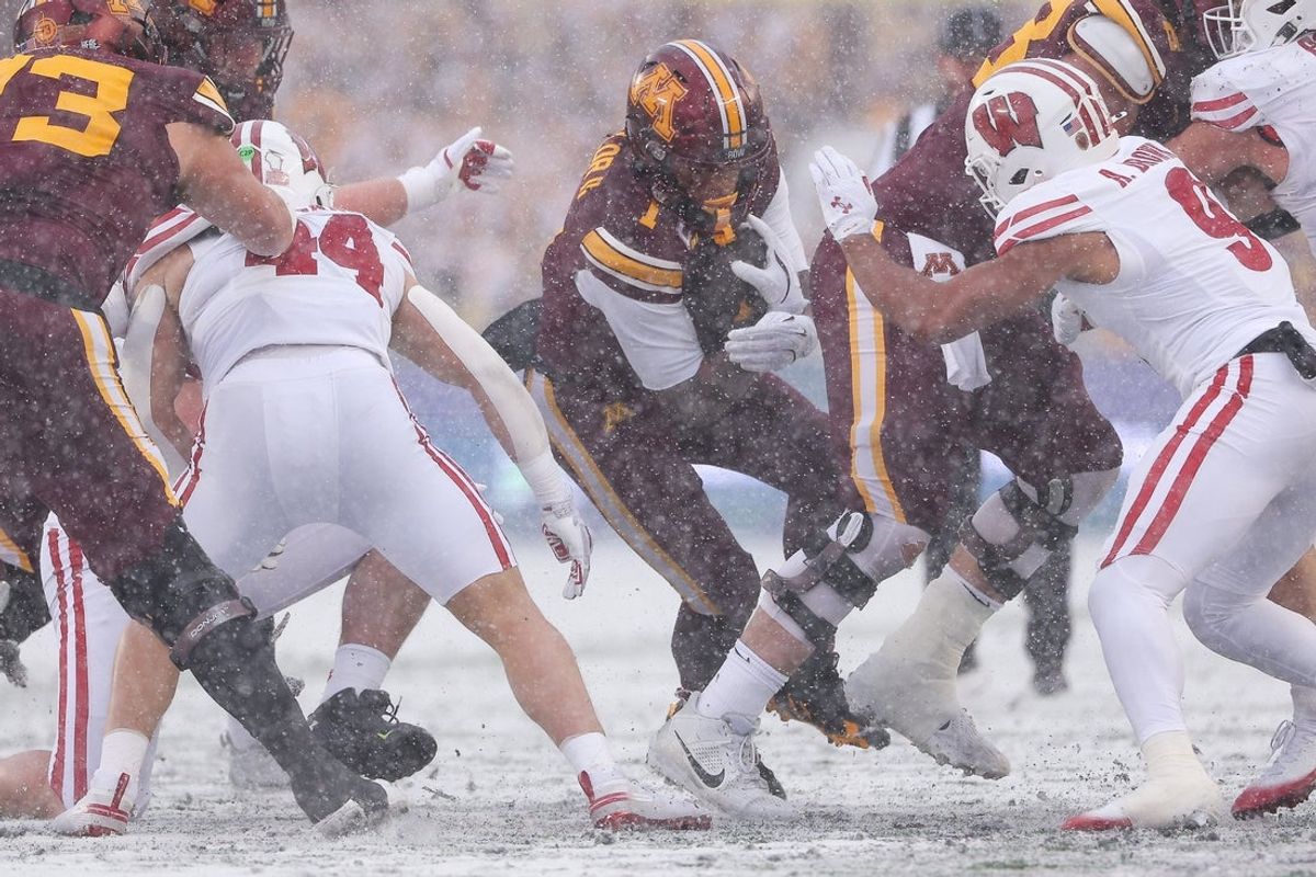 Nov 29, 2025; Minneapolis, Minnesota, USA; Minnesota Golden Gophers running back Darius Taylor (1) runs the ball against the Wisconsin Badgers during the first half at Huntington Bank Stadium. Mandatory Credit: Matt Krohn-Imagn Images