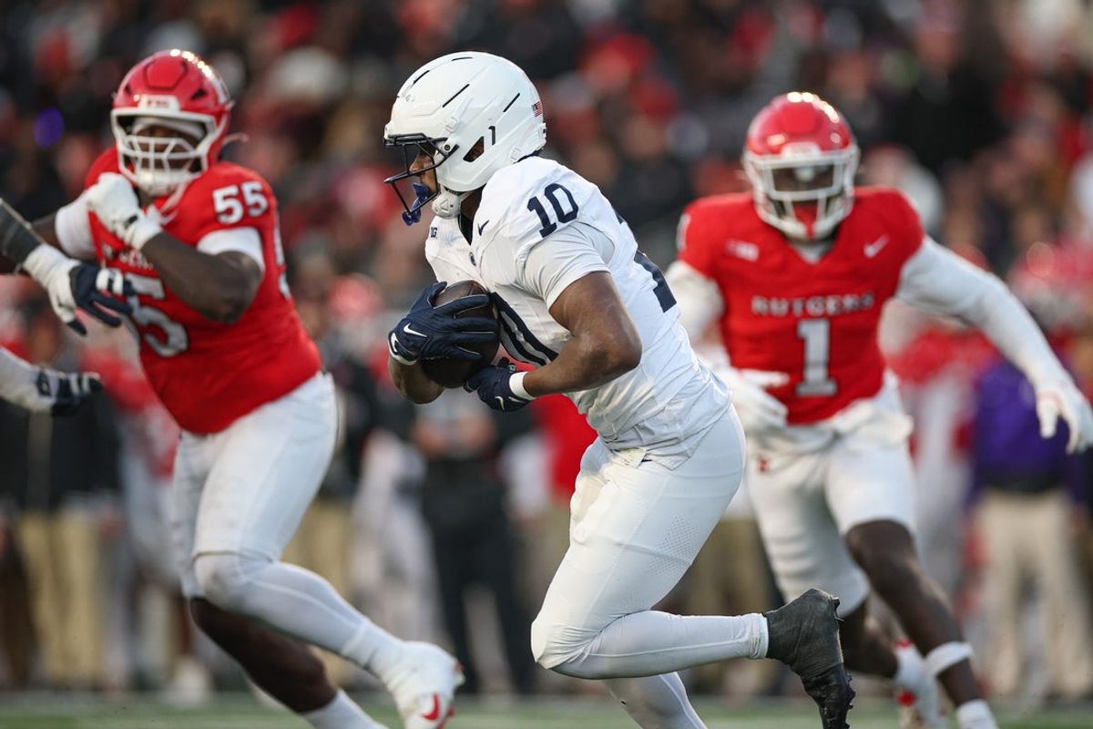 Nov 29, 2025; Piscataway, New Jersey, USA; Penn State Nittany Lions running back Nicholas Singleton (10) carries the ball against the Rutgers Scarlet Knights during the first half at SHI Stadium. Mandatory Credit: Vincent Carchietta-Imagn Images