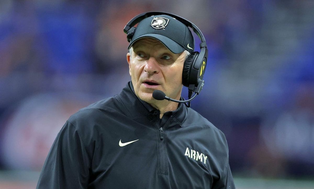 Nov 29, 2025; San Antonio, Texas, USA; Army Black Knights head coach Jeff Monken checks the clock during the first half against the UTSA Roadrunners at the Alamodome. Mandatory Credit: Danny Wild-Imagn Images