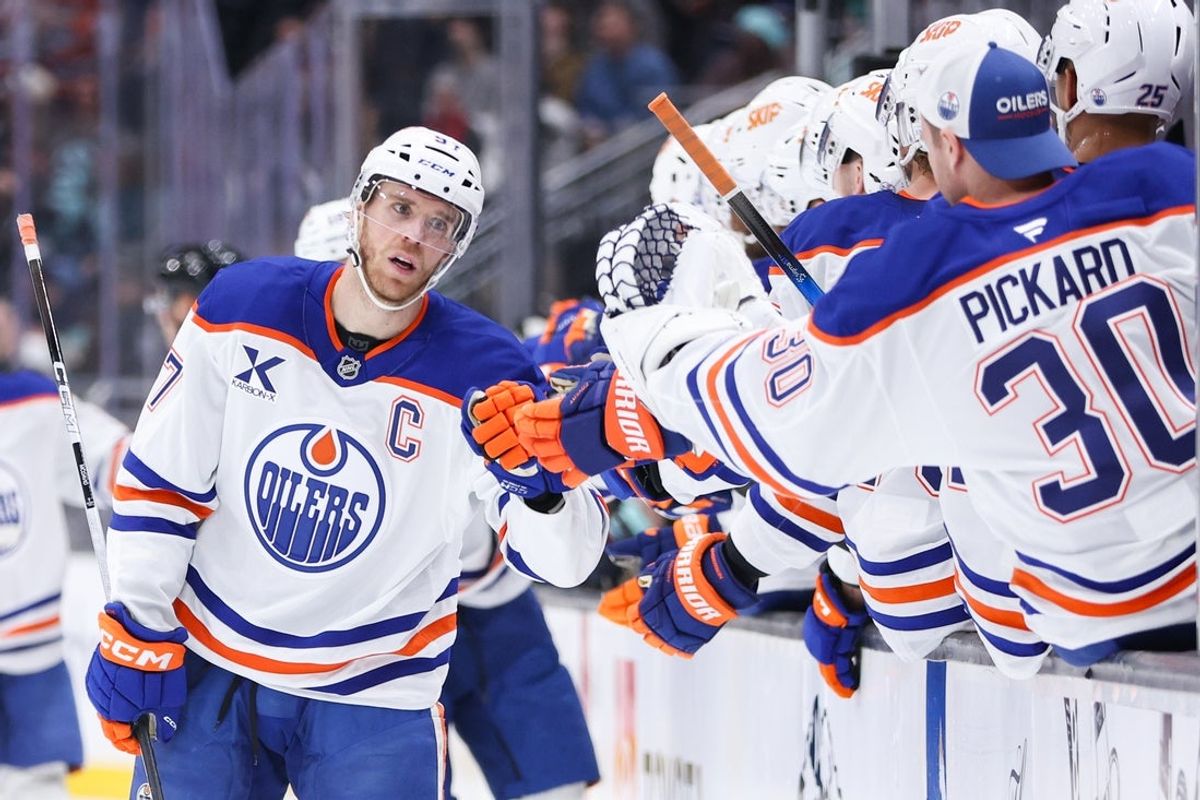 Nov 29, 2025; Seattle, Washington, USA;  Edmonton Oilers center Connor McDavid (97) celebrates a goal against the Seattle Kraken in the third period at Climate Pledge Arena. Mandatory Credit: Kevin Ng-Imagn Images