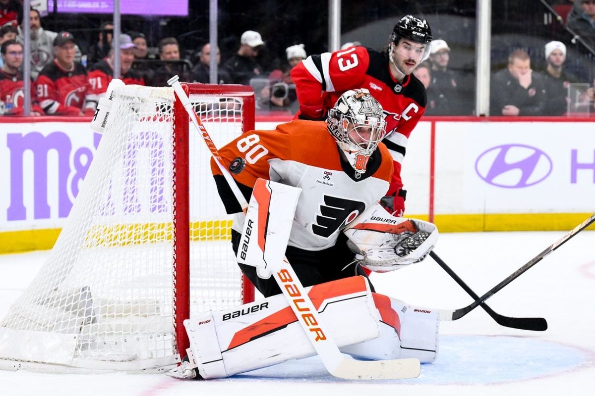Nov 29, 2025; Newark, New Jersey, USA; Philadelphia Flyers goaltender Dan Vladar (80) makes a save against the New Jersey Devils during the second period at Prudential Center. Mandatory Credit: John Jones-Imagn Images