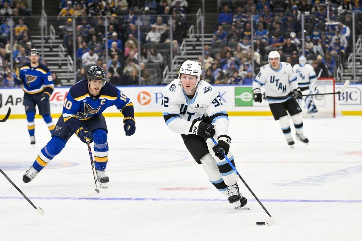 Nov 29, 2025; St. Louis, Missouri, USA; Utah Mammoth center Logan Cooley (92) controls the puck against the St. Louis Blues during the first period at Enterprise Center. Mandatory Credit: Jeff Curry-Imagn Images