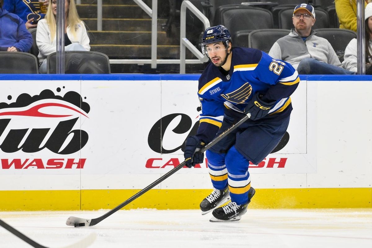 Nov 29, 2025; St. Louis, Missouri, USA; St. Louis Blues right wing Jordan Kyrou (25) controls the puck against the Utah Mammoth during the second period at Enterprise Center. Mandatory Credit: Jeff Curry-Imagn Images