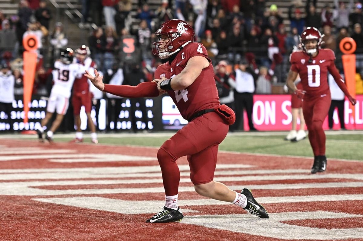 Nov 29, 2025; Pullman, Washington, USA; Washington State Cougars quarterback Zevi Eckhaus (4) makes a bowling motion after a touchdown against the Oregon State Beavers in the second half at Gesa Field at Martin Stadium. Washington State Cougars won 32-8. Mandatory Credit: James Snook-Imagn Images