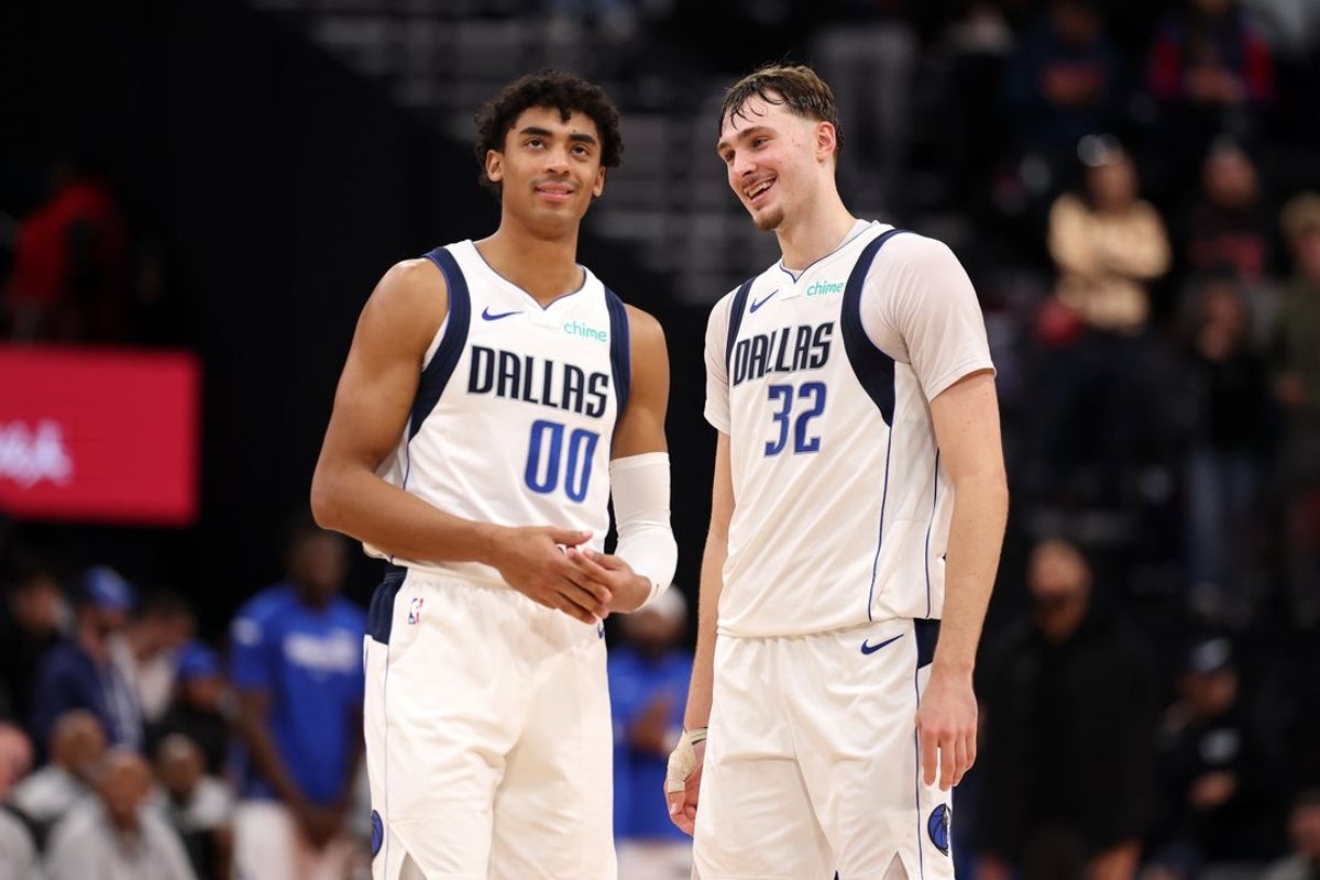 Nov 29, 2025; Inglewood, California, USA;  Dallas Mavericks guard Max Christie (00) and forward Cooper Flagg (32) chat during the fourth quarter against the Los Angeles Clippers at Intuit Dome. Mandatory Credit: Kiyoshi Mio-Imagn Images