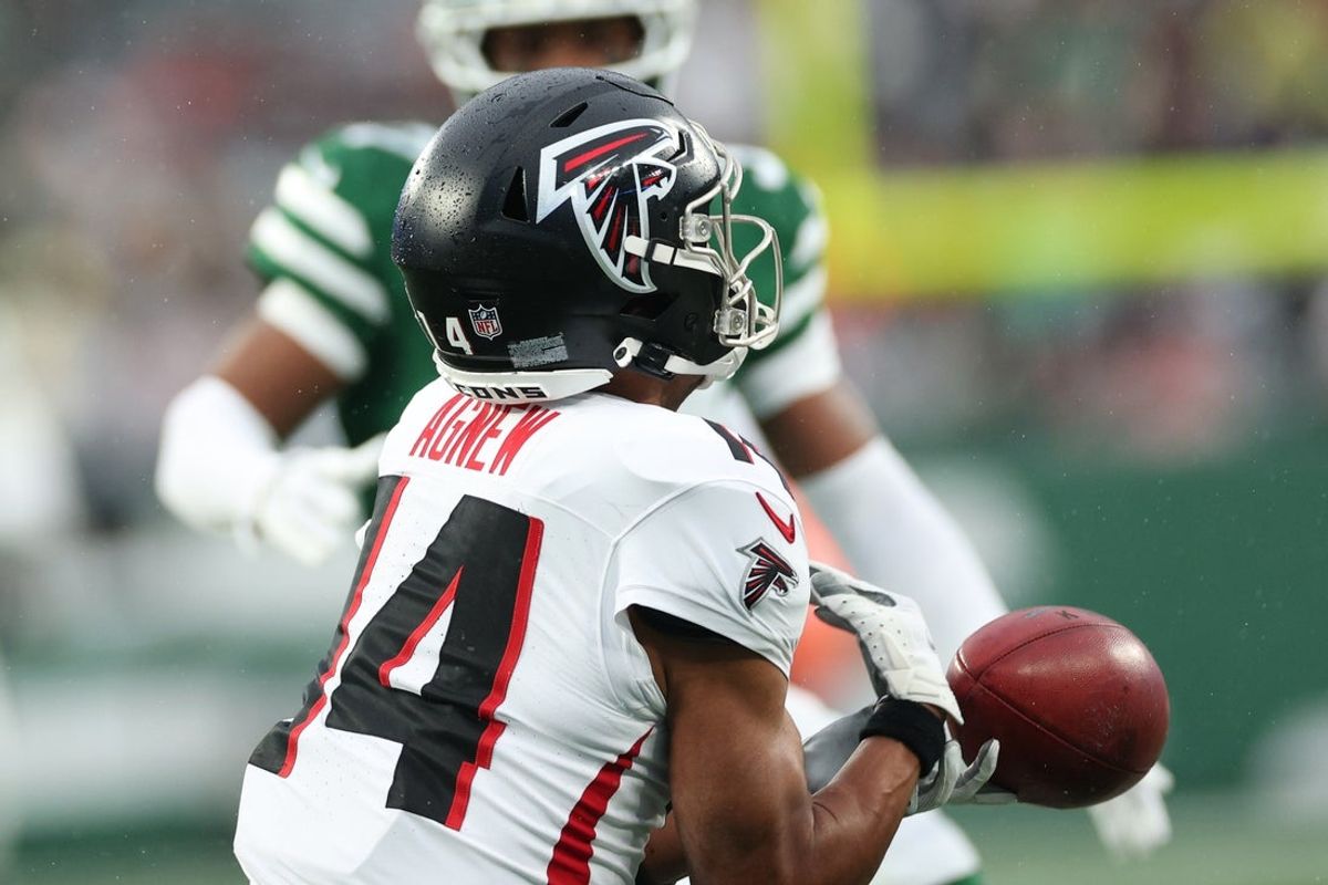 Nov 30, 2025; East Rutherford, New Jersey, USA; Atlanta Falcons wide receiver Jamal Agnew (14) fumbles a punt return against the New York Jets during the first half at MetLife Stadium. Mandatory Credit: Vincent Carchietta-Imagn Images