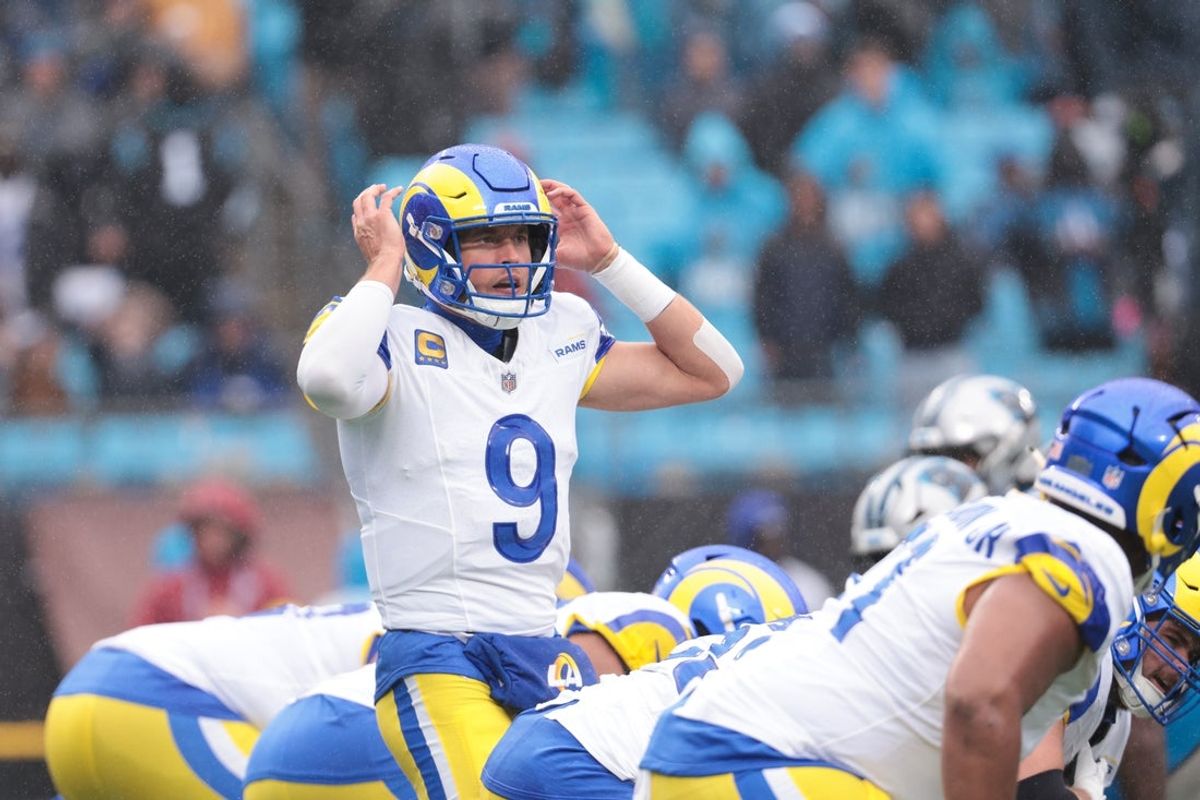 Nov 30, 2025; Charlotte, North Carolina, USA; Los Angeles Rams quarterback Matthew Stafford (9) calls a play during the fourth quarter against the Carolina Panthers at Bank of America Stadium. Mandatory Credit: Scott Kinser-Imagn Images