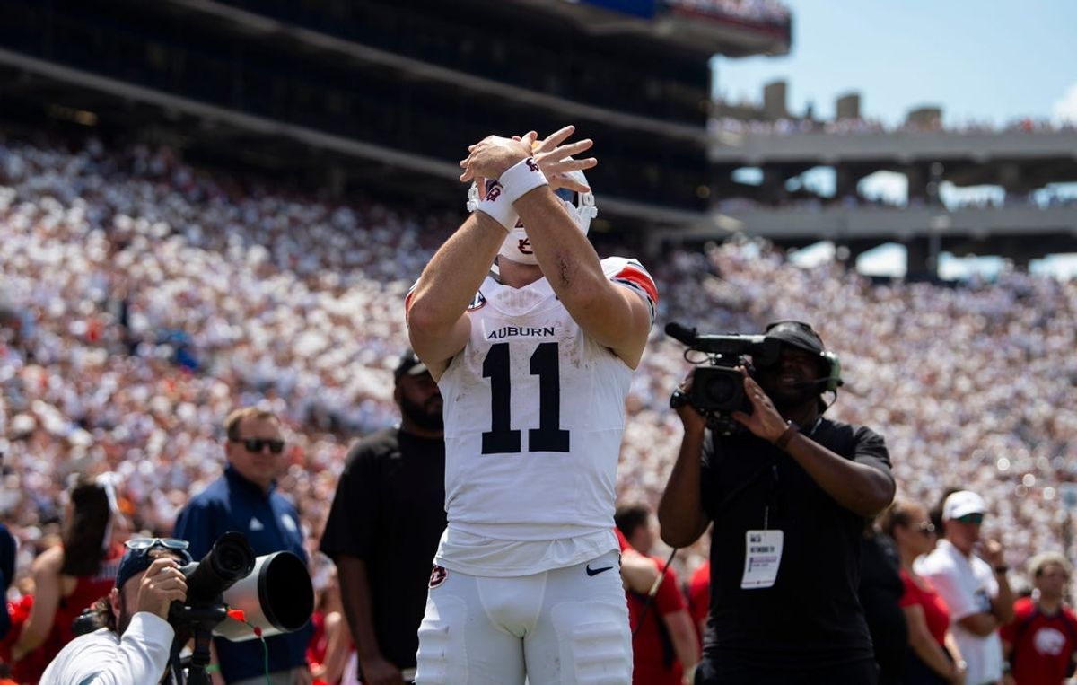 Auburn Tigers quarterback Jackson Arnold (11) celebrates his touchdown run as Auburn Tigers take on South Alabama Jaguars at Jordan-Hare Stadium in Auburn, Ala. on Saturday, Sept. 13, 2025. Auburn Tigers lead South Alabama Jaguars 28-9 at halftime.