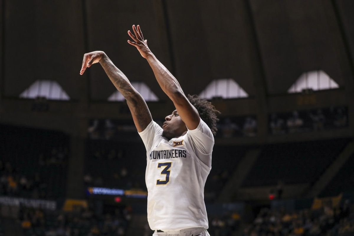 Nov 30, 2025; Morgantown, West Virginia, USA; West Virginia Mountaineers guard Honor Huff (3) shoots during the second half against the Mercyhurst Lakers at Hope Coliseum. Mandatory Credit: Ben Queen-Imagn Images