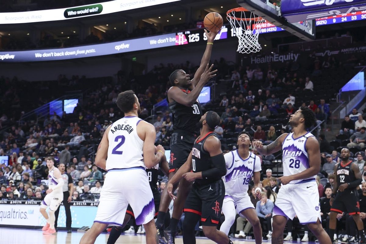 Nov 30, 2025; Salt Lake City, Utah, USA; Houston Rockets center Clint Capela (30) shoots against the Utah Jazz during the second half at Delta Center. Mandatory Credit: Rob Gray-Imagn Images