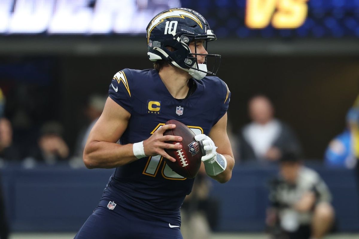 Nov 30, 2025; Inglewood, California, USA; Los Angeles Chargers quarterback Justin Herbert (10) drops back to pass against the Las Vegas Raiders during the second half at SoFi Stadium. Mandatory Credit: Kiyoshi Mio-Imagn Images