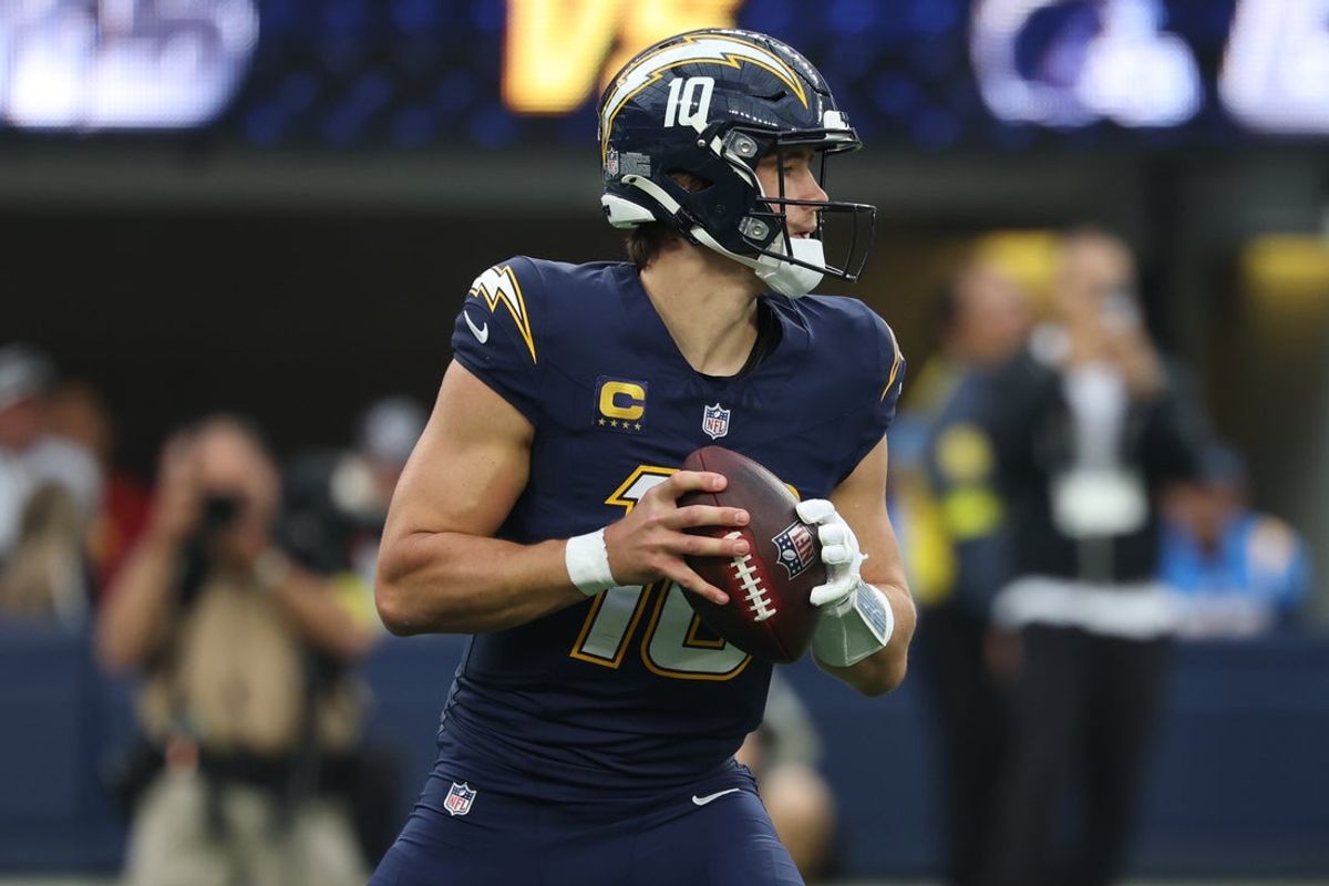 Nov 30, 2025; Inglewood, California, USA; Los Angeles Chargers quarterback Justin Herbert (10) drops back to pass against the Las Vegas Raiders during the second half at SoFi Stadium. Mandatory Credit: Kiyoshi Mio-Imagn Images