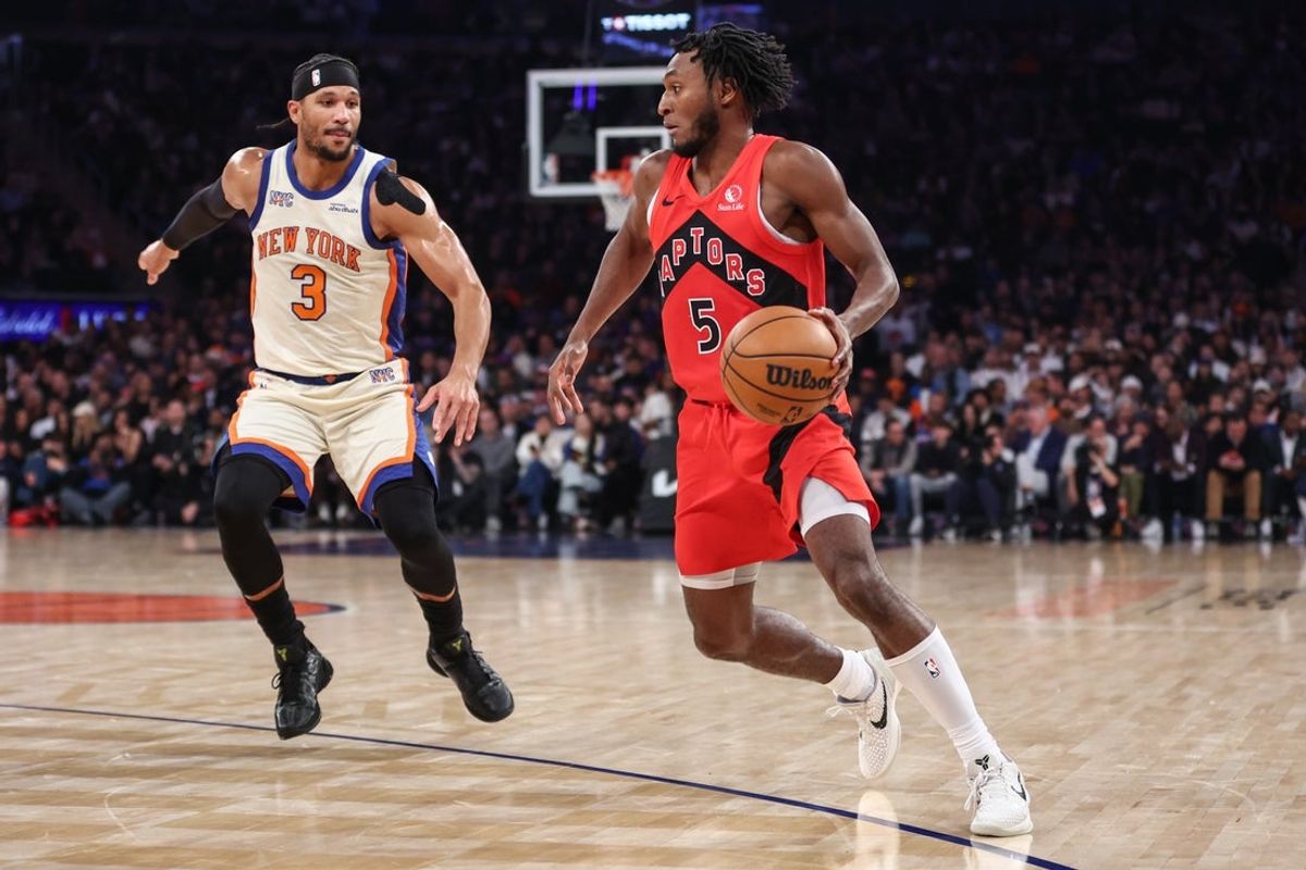 Nov 30, 2025; New York, New York, USA;  Toronto Raptors guard Immanuel Quickley (5) drives past New York Knicks guard Josh Hart (3) in the first quarter at Madison Square Garden. Mandatory Credit: Wendell Cruz-Imagn Images