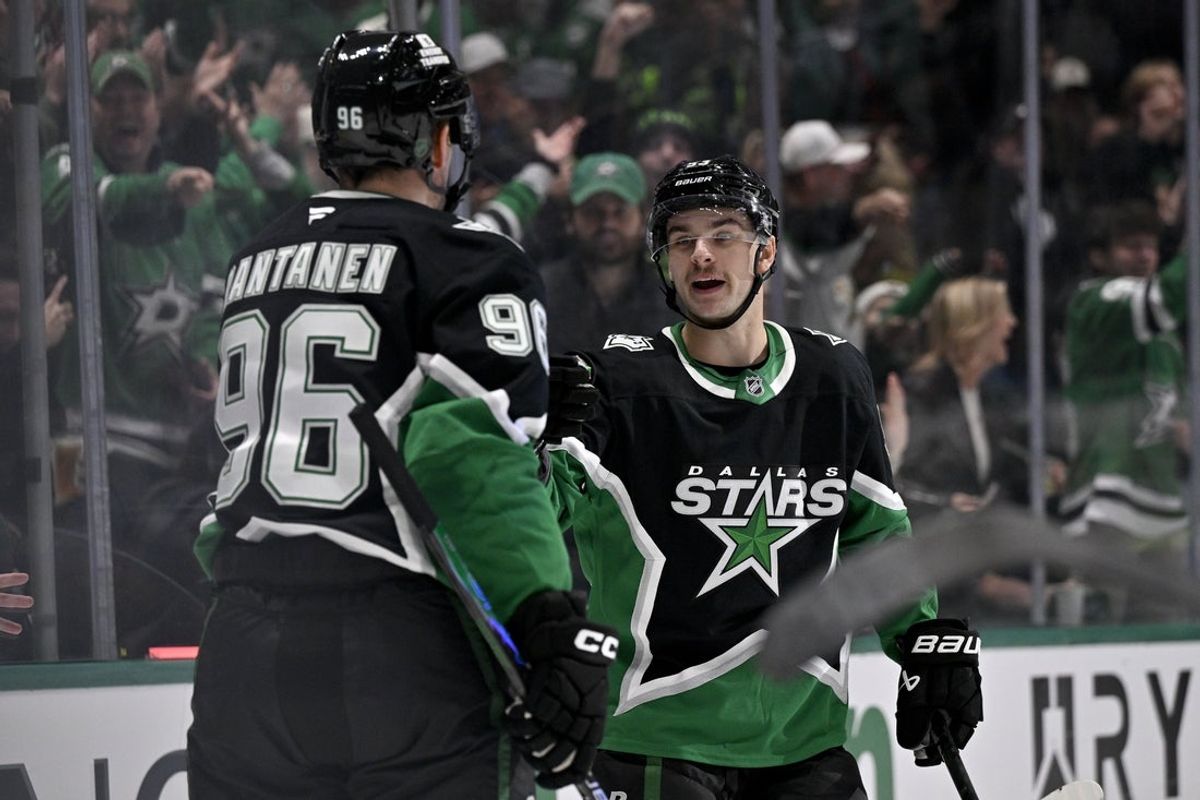 Nov 30, 2025; Dallas, Texas, USA; Dallas Stars right wing Mikko Rantanen (96) and center Wyatt Johnston (53) celebrates a goal scored by Johnston against the Ottawa Senators during the second period at the American Airlines Center. Mandatory Credit: Jerome Miron-Imagn Images