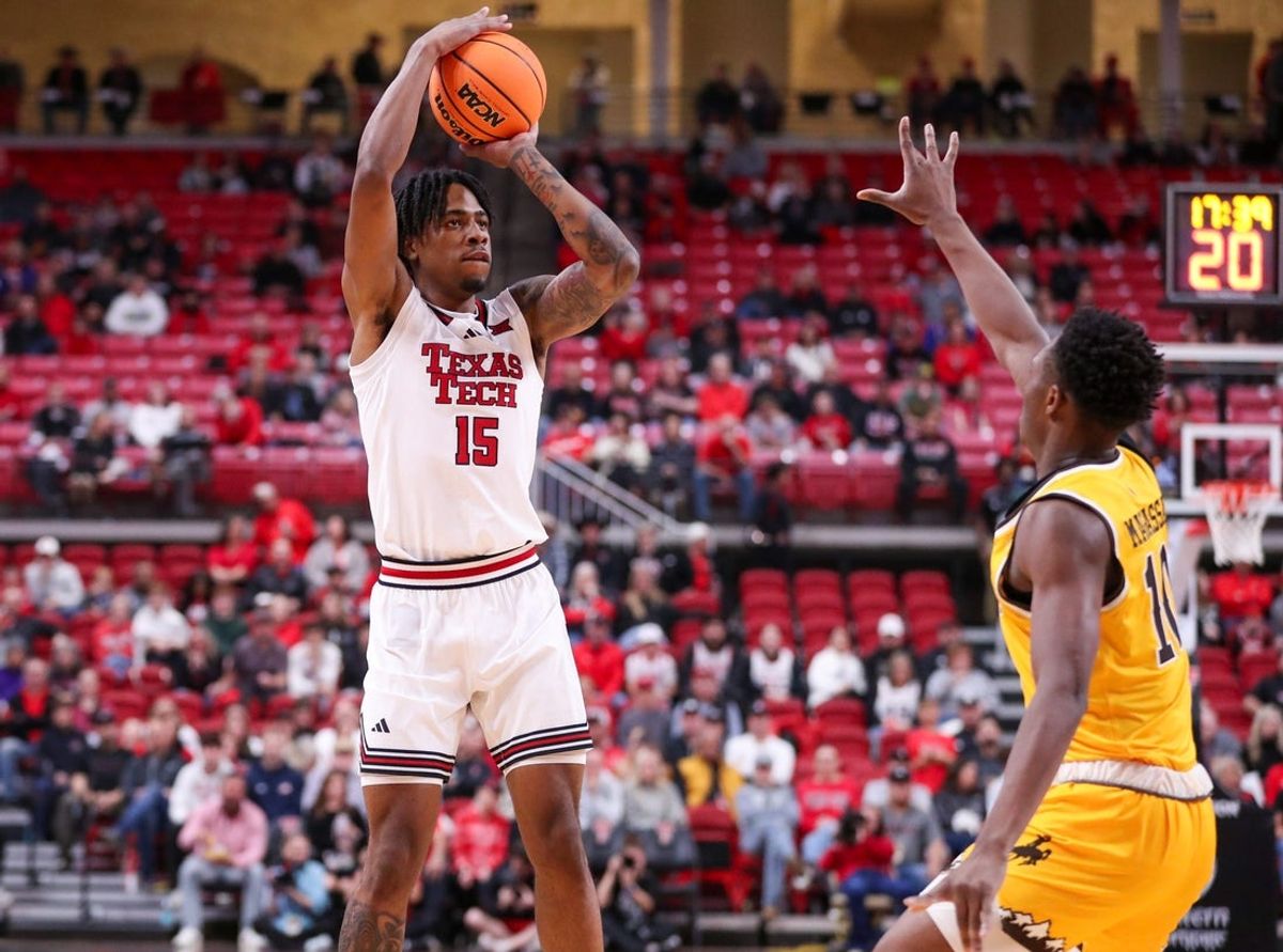 Texas Tech's JT Toppin shoots a 3-pointer against Wyoming during a non-conference men's basketball game, Sunday, Nov. 30, 2025, at United Supermarkets Arena.