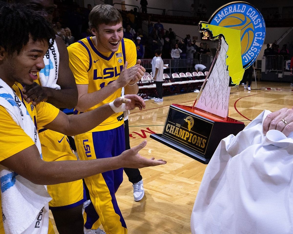 LSU's Dedan Thomas Jr. (11) and Matt Gilhool (13) are seen after defeating DePaul during the Emerald Coast Classic championship game at Raider Arena in Niceville, Fla., Nov. 29, 2025. The Tigers won the contest 96-63. (Tyler Orsburn/News Herald)