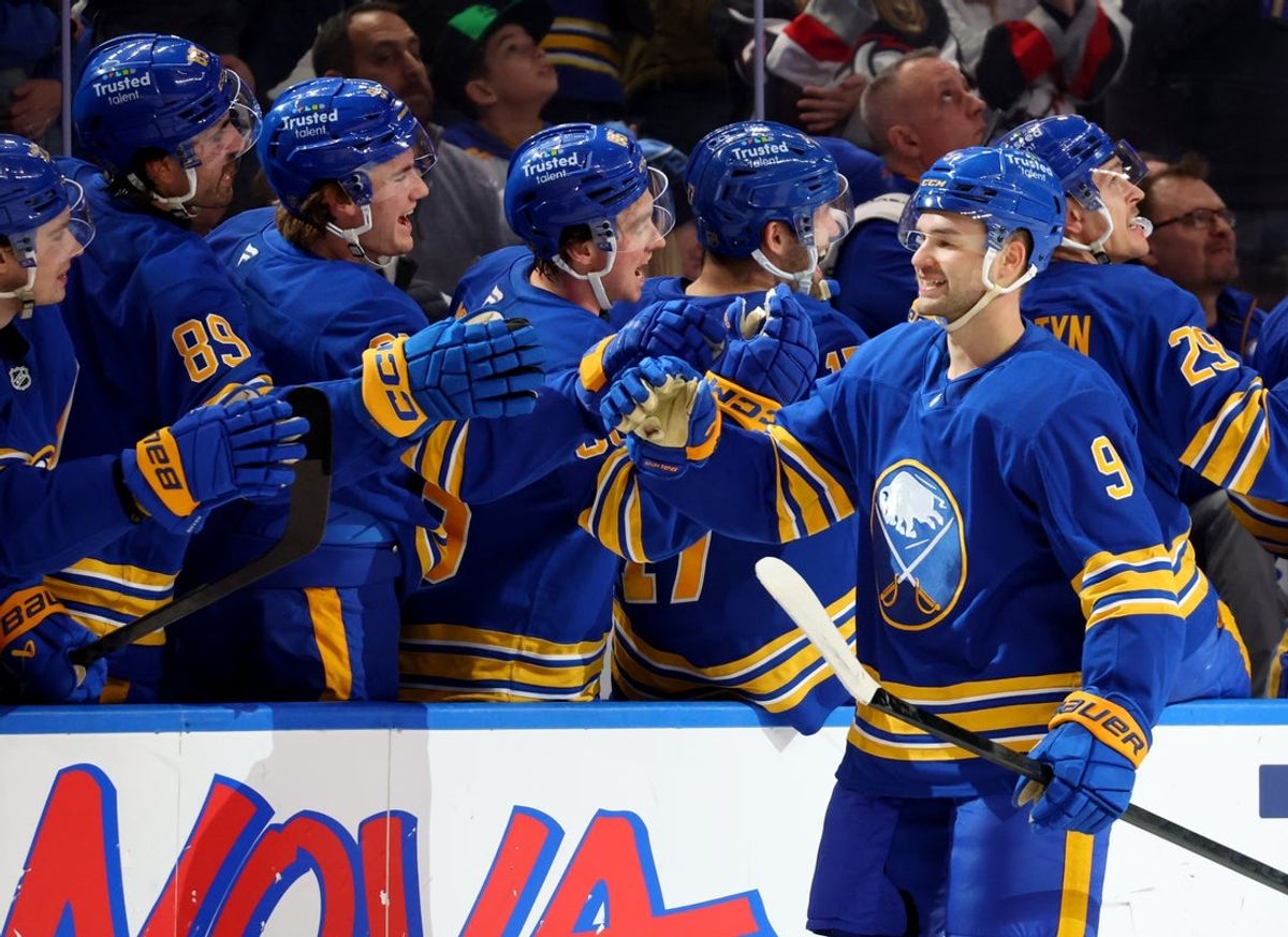 Dec 1, 2025; Buffalo, New York, USA;  Buffalo Sabres center Josh Norris (9) celebrates his goal with teammates during the first period against the Winnipeg Jets at KeyBank Center. Mandatory Credit: Timothy T. Ludwig-Imagn Images