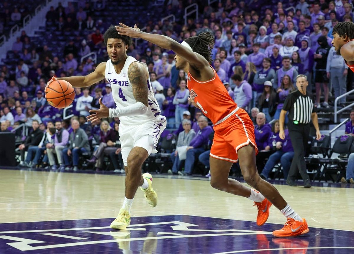 Dec 1, 2025; Manhattan, Kansas, USA; Kansas State Wildcats guard P.J. Haggerty (4) is guarded by Bowling Green Falcons guard Javontae Campbell (2) during the first half at Bramlage Coliseum. Mandatory Credit: Scott Sewell-Imagn Images