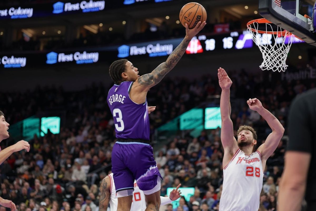 Dec 1, 2025; Salt Lake City, Utah, USA;  Utah Jazz guard Keyonte George (3) shoots the ball over Houston Rockets center Alperen Sengun (28) during the first quarter at Delta Center. Mandatory Credit: Chris Nicoll-Imagn Images
