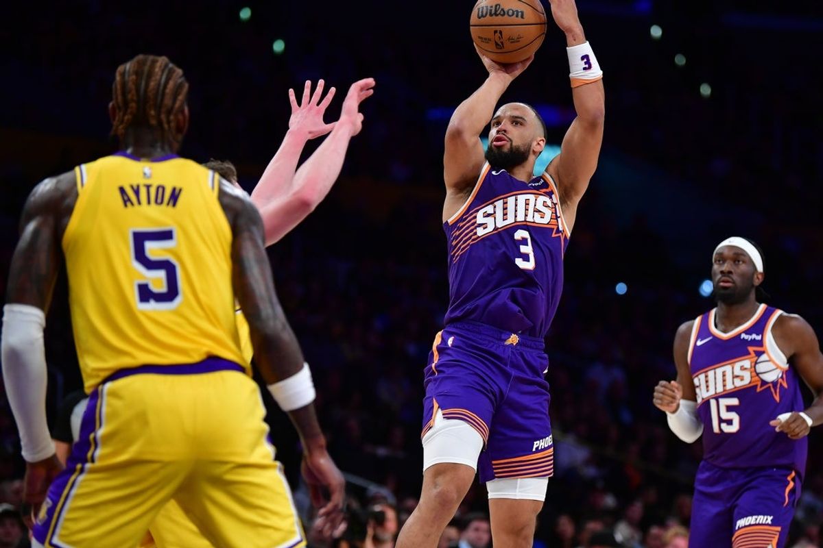 Dec 1, 2025; Los Angeles, California, USA; Phoenix Suns forward Dillon Brooks (3) shoots against the Los Angeles Lakers during the first half at Crypto.com Arena. Mandatory Credit: Gary A. Vasquez-Imagn Images