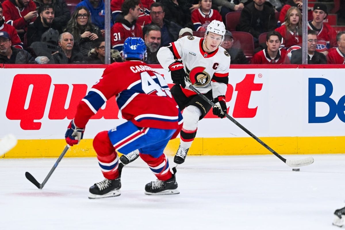 Dec 2, 2025; Montreal, Quebec, CAN; Ottawa Senators left wing Brady Tkachuk (7) plays the puck against Montreal Canadiens defenseman Alexandre Carrier (45) during the first period at Bell Centre. Mandatory Credit: David Kirouac-Imagn Images