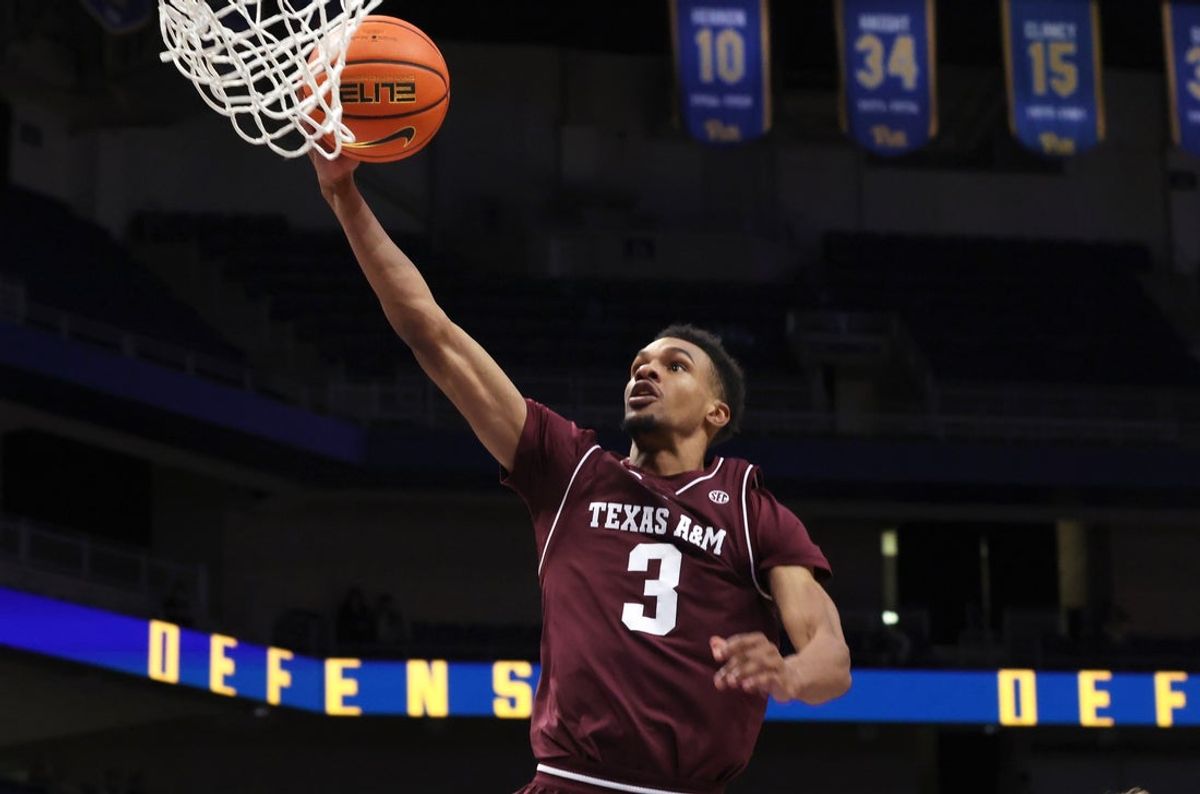 Dec 2, 2025; Pittsburgh, Pennsylvania, USA;  Texas A&M Aggies guard Rylan Griffen (3) goes to the basket against the Pittsburgh Panthers during the first half at the Petersen Events Center. Mandatory Credit: Charles LeClaire-Imagn Images