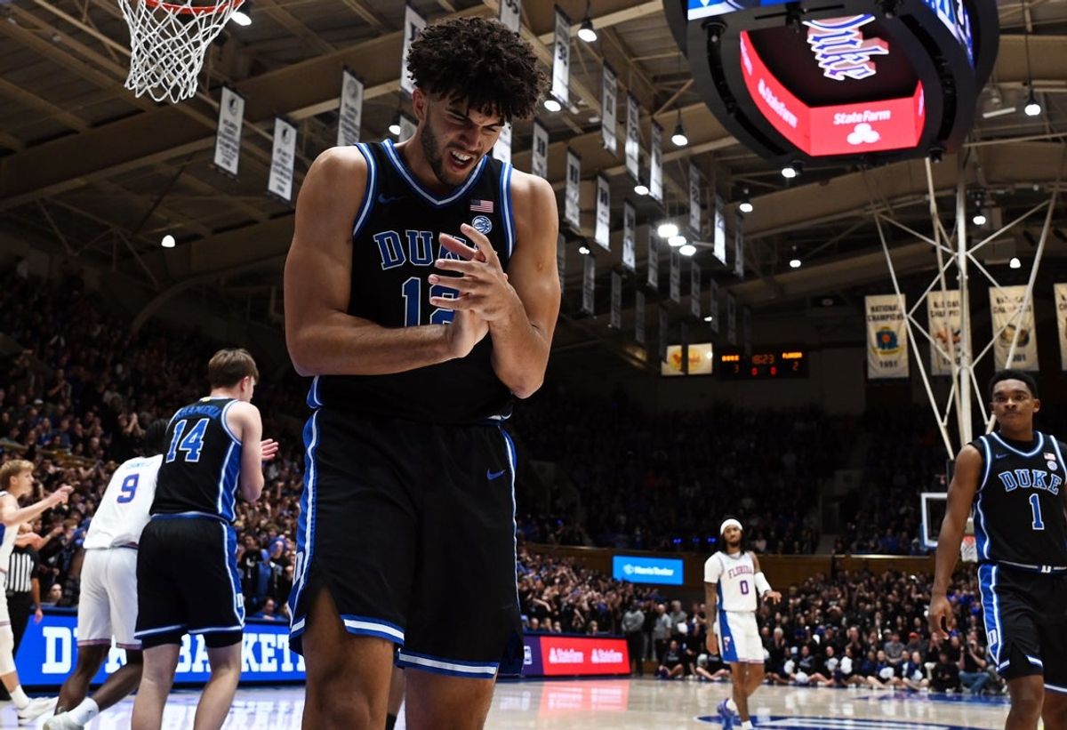 Dec 2, 2025; Durham, North Carolina, USA; Duke Blue Devils forward Cameron Boozer (12) reacts after forcing a turnover against the Florida Gators during the first half at Cameron Indoor Stadium. Mandatory Credit: Rob Kinnan-Imagn Images