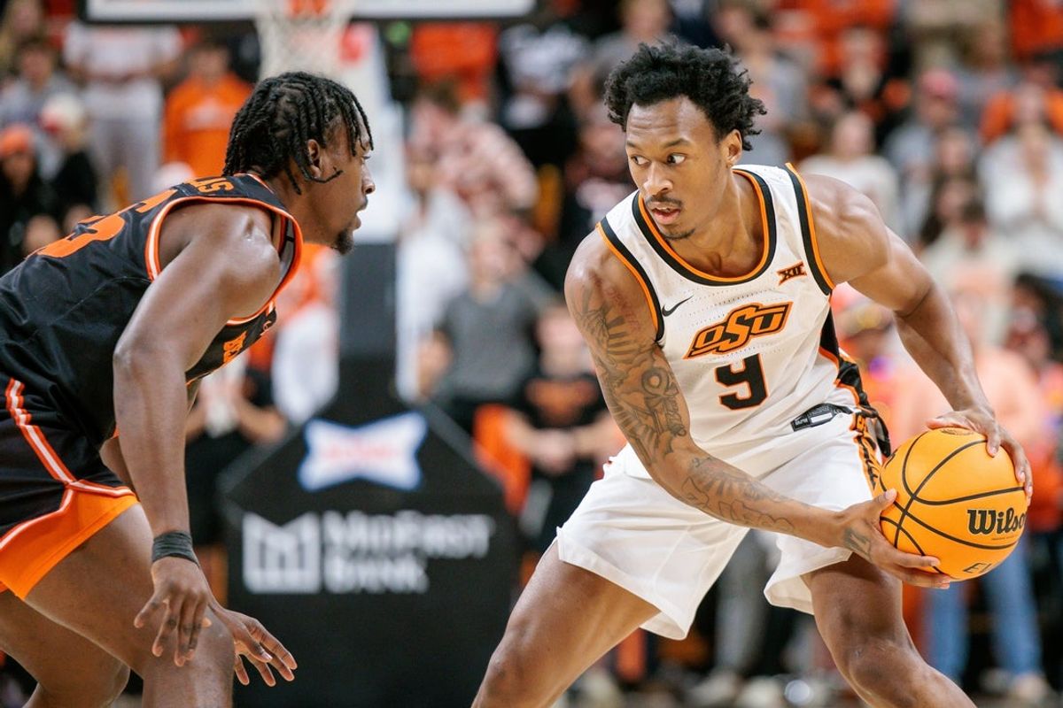 Dec 2, 2025; Stillwater, Oklahoma, USA; Oklahoma State Cowboys guard Anthony Roy (9) brings the ball up court during the first half against the Sam Houston Bearkats at Gallagher-Iba Arena. Mandatory Credit: William Purnell-Imagn Images