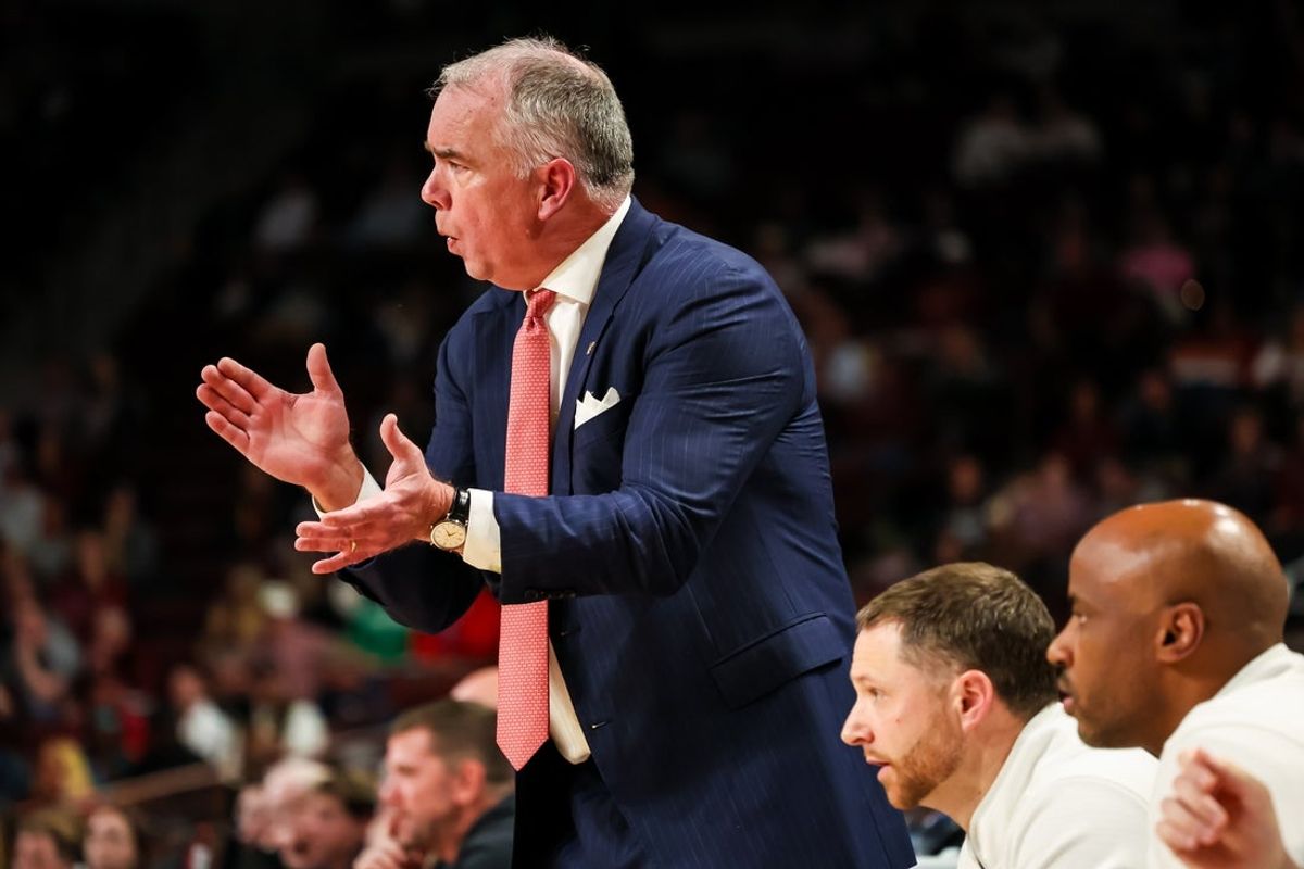 Dec 2, 2025; Columbia, South Carolina, USA; Virginia Tech Hokies head coach Mike Young directs his team against the South Carolina Gamecocks in the first half at Colonial Life Arena. Mandatory Credit: Jeff Blake-Imagn Images