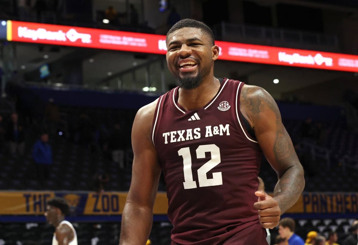Dec 2, 2025; Pittsburgh, Pennsylvania, USA;  Texas A&M Aggies forward Rashaun Agee (12) reacts after defeating the Pittsburgh Panthers at the Petersen Events Center. Mandatory Credit: Charles LeClaire-Imagn Images