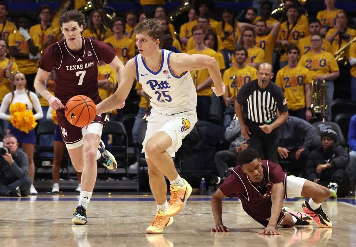 Dec 2, 2025; Pittsburgh, Pennsylvania, USA;  Pittsburgh Panthers guard Nojus Indrusaitis (25) dribbles up court on a fast-break against the Texas A&M Aggies during the second half at the Petersen Events Center. Mandatory Credit: Charles LeClaire-Imagn Images