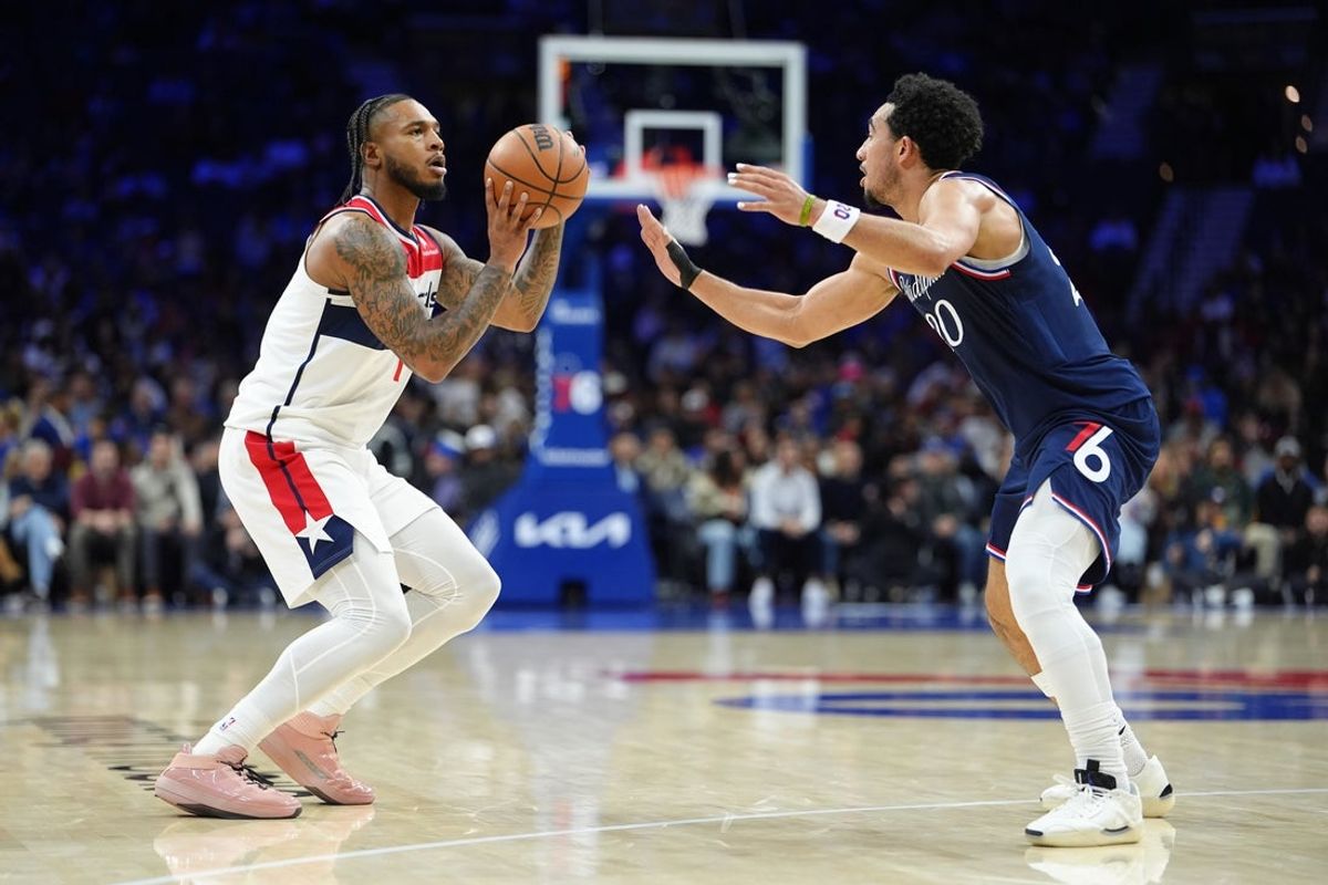 Dec 2, 2025; Philadelphia, Pennsylvania, USA; Washington Wizards forward Cam Whitmore (1) shoots the ball against Philadelphia 76ers guard Jared McCain (20) in the second quarter at Xfinity Mobile Arena. Mandatory Credit: Kyle Ross-Imagn Images