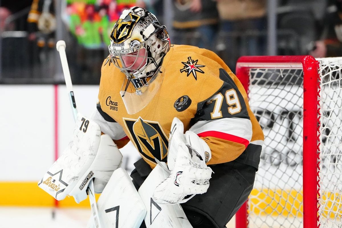Dec 2, 2025; Las Vegas, Nevada, USA; Vegas Golden Knights goaltender Carter Hart (79) warms up before a game against the Chicago Blackhawks at T-Mobile Arena. Mandatory Credit: Stephen R. Sylvanie-Imagn Images