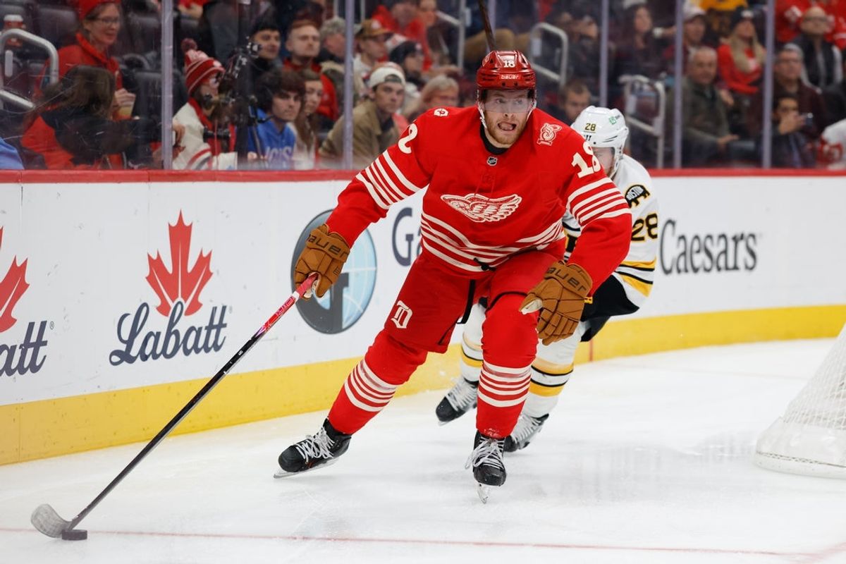 Dec 2, 2025; Detroit, Michigan, USA;  Detroit Red Wings center Andrew Copp (18) skates with the puck in the third period against the Boston Bruins at Little Caesars Arena. Mandatory Credit: Rick Osentoski-Imagn Images