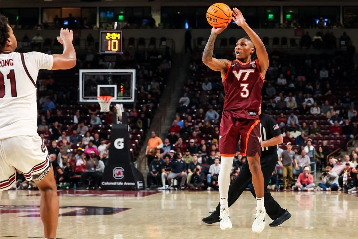 Dec 2, 2025; Columbia, South Carolina, USA; Virginia Tech Hokies guard Ben Hammond (3) attempts a three point basket against the South Carolina Gamecocks in the second half at Colonial Life Arena. Mandatory Credit: Jeff Blake-Imagn Images