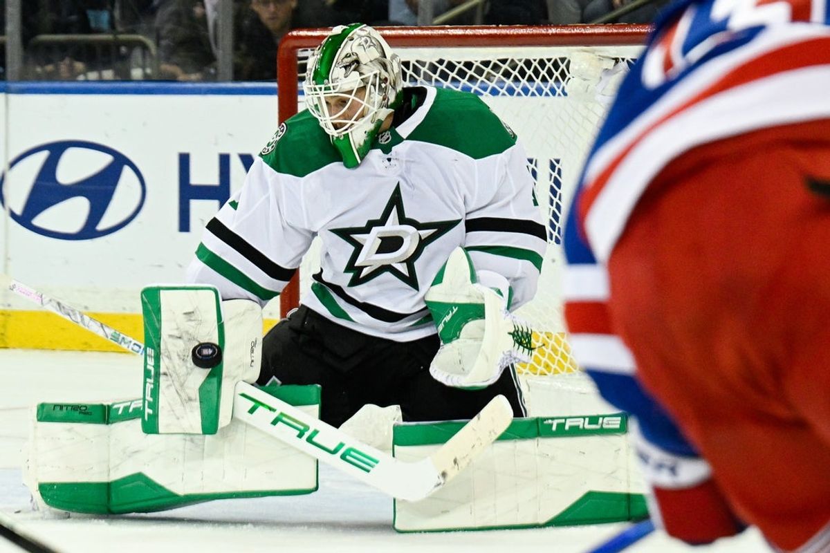 Dec 2, 2025; New York, New York, USA;  Dallas Stars goaltender Casey DeSmith (1) makes a save against the New York Rangers during the third period at Madison Square Garden. Mandatory Credit: Dennis Schneidler-Imagn Images