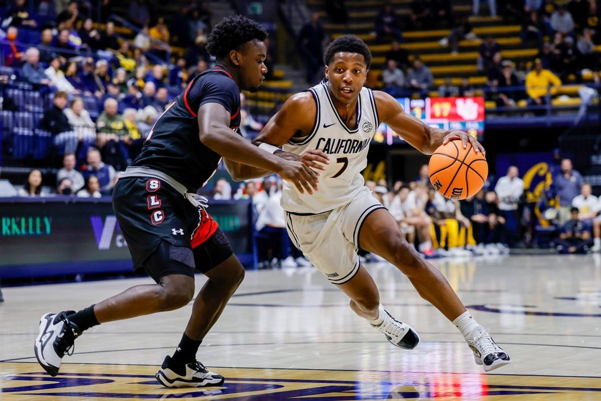 Dec 2, 2025; Berkeley, California, USA; California Golden Bears guard Dai Dai Ames (7) drives with the ball during the first half against the Utah Utes at Haas Pavilion. Mandatory Credit: Bob Kupbens-Imagn Images