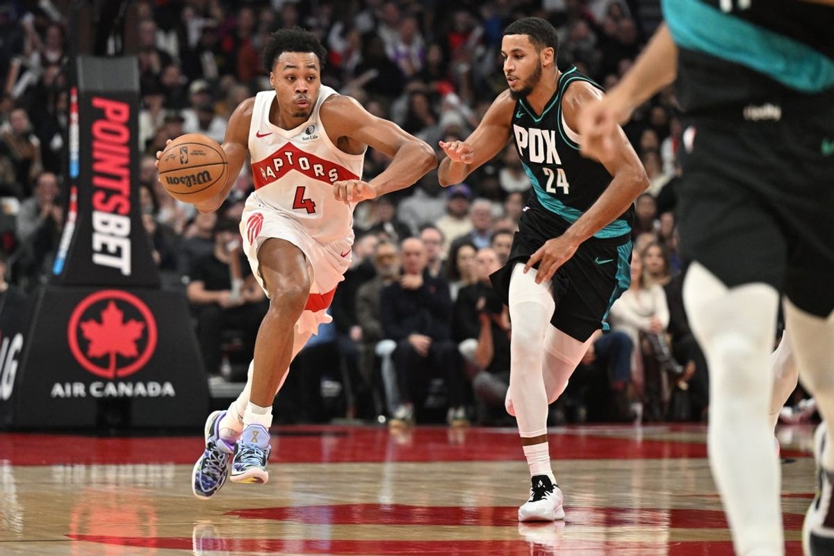 Dec 2, 2025; Toronto, Ontario, CAN; Toronto Raptors forward Scottie Barnes (4) dribbles the ball past Portland Trail Blazers forward Kris Murray (24) in the second half at Scotiabank Arena. Mandatory Credit: Dan Hamilton-Imagn Images