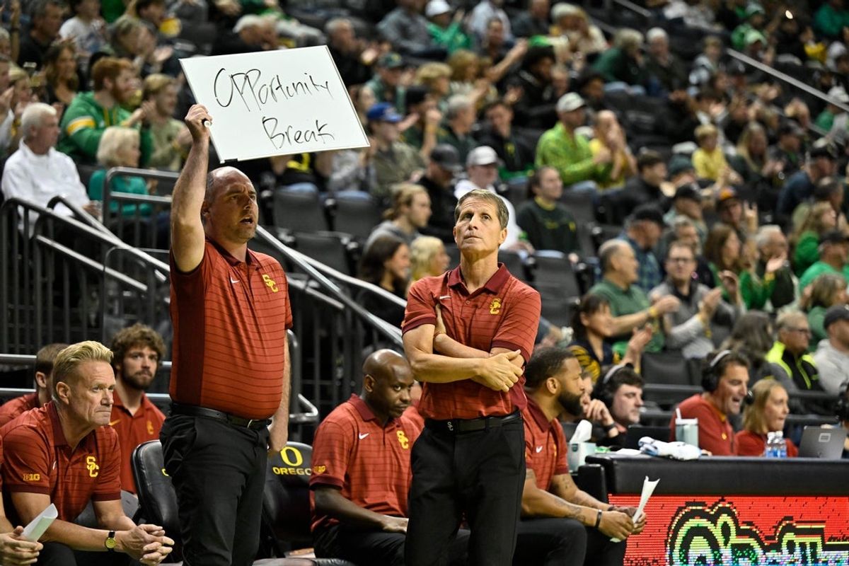 Dec 2, 2025; Eugene, Oregon, USA; Southern California Trojans head coach Eric Musselman, right, reacts during the first half against the Oregon Ducks at Matthew Knight Arena. Mandatory Credit: Craig Strobeck-Imagn Images