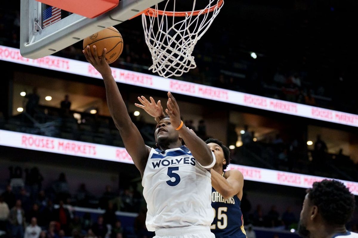 Dec 2, 2025; New Orleans, Louisiana, USA; Minnesota Timberwolves guard Anthony Edwards (5) makes a basket against New Orleans Pelicans forward Trey Murphy III (25) to tie the game in late in the fourth quarter and to send the game into overtime at Smoothie King Center. Mandatory Credit: Matthew Hinton-Imagn Images