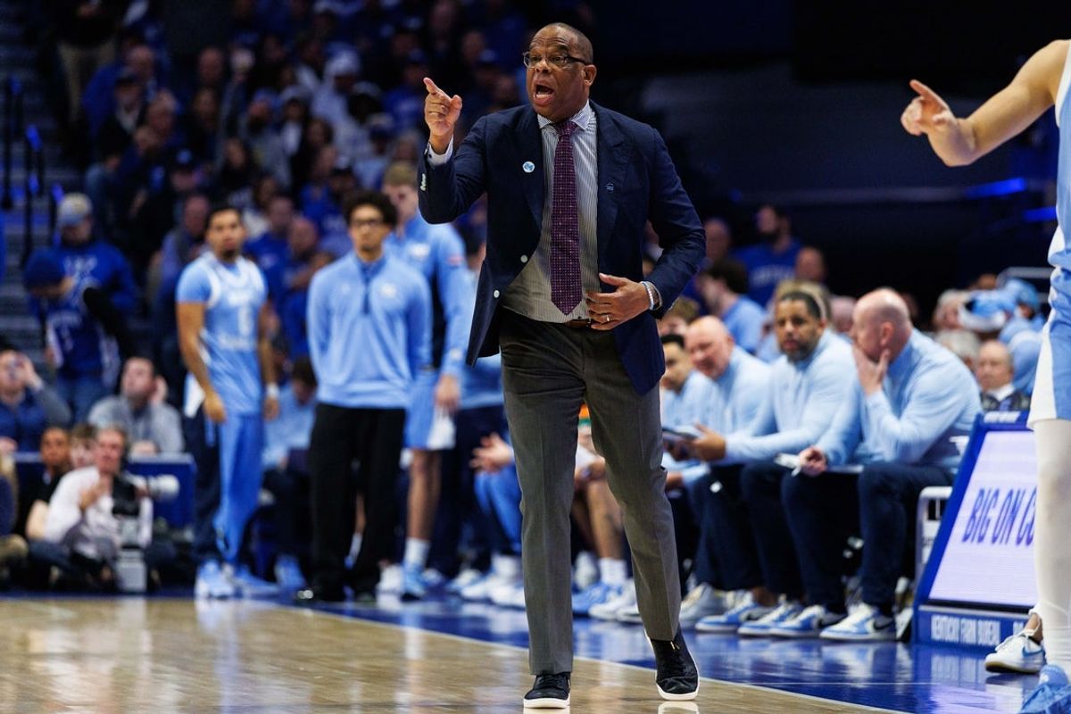 Dec 2, 2025; Lexington, Kentucky, USA; North Carolina Tar Heels head coach Hubert Davis calls out a play during the first half against the Kentucky Wildcats at Rupp Arena at Central Bank Center. Mandatory Credit: Jordan Prather-Imagn Images