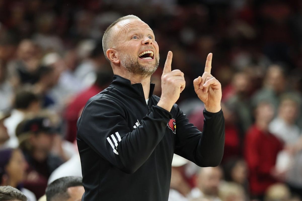 Dec 3, 2025; Fayetteville, Arkansas, USA;  Louisville Cardinals head coach Pat Kelsey during the first half against the Arkansas Razorbacks at Bud Walton Arena. Mandatory Credit: Nelson Chenault-Imagn Images