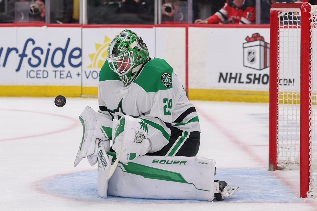 Dec 3, 2025; Newark, New Jersey, USA; Dallas Stars goaltender Jake Oettinger (29) makes a save against the New Jersey Devils during the second period at Prudential Center. Mandatory Credit: Ed Mulholland-Imagn Images