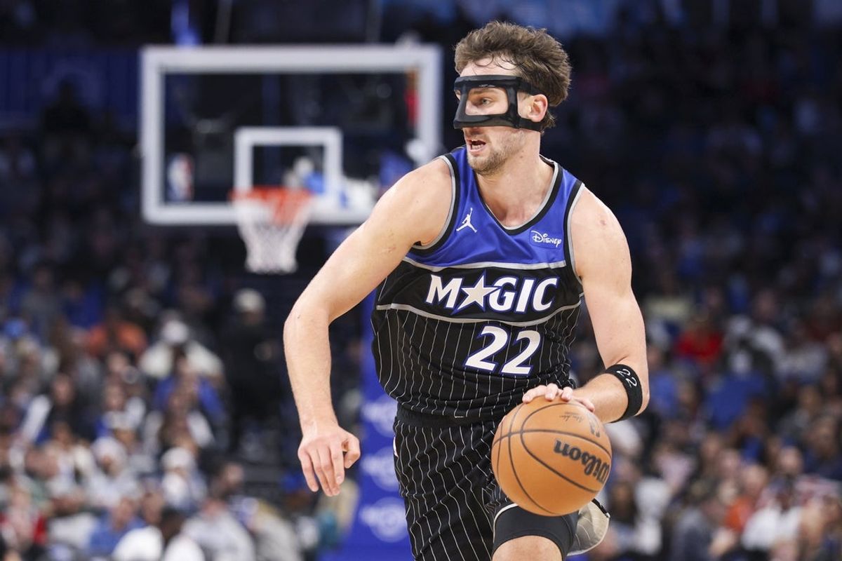 Dec 3, 2025; Orlando, Florida, USA; Orlando Magic forward Franz Wagner (22) controls the ball against the San Antonio Spurs in the third quarter at Kia Center. Mandatory Credit: Nathan Ray Seebeck-Imagn Images