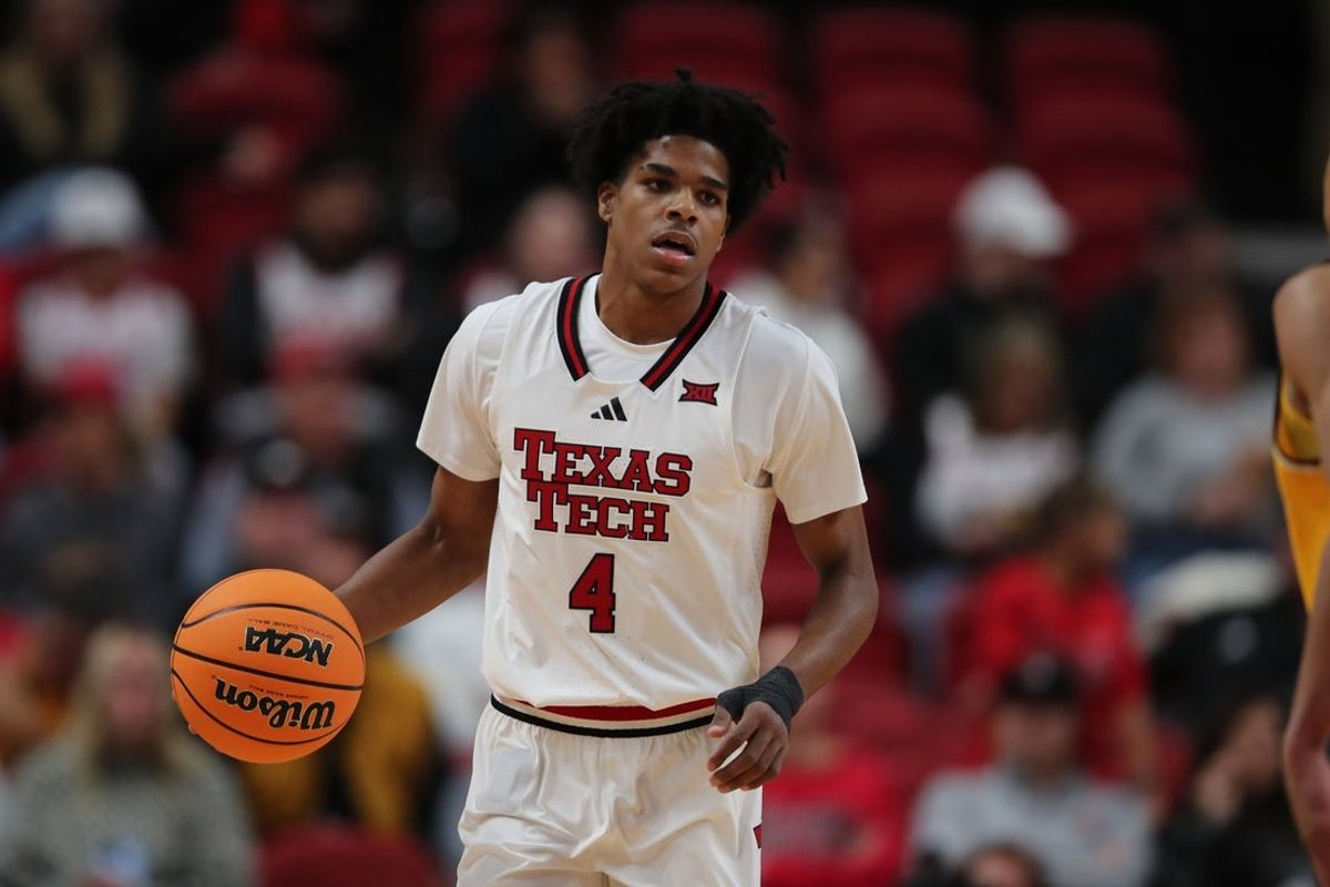 Nov 30, 2025; Lubbock, Texas, USA;  Texas Tech Red Raiders guard Christian Anderson (4) with the ball in the first half against the Wyoming Cowboys at United Supermarkets Arena. Mandatory Credit: Michael C. Johnson-Imagn Images