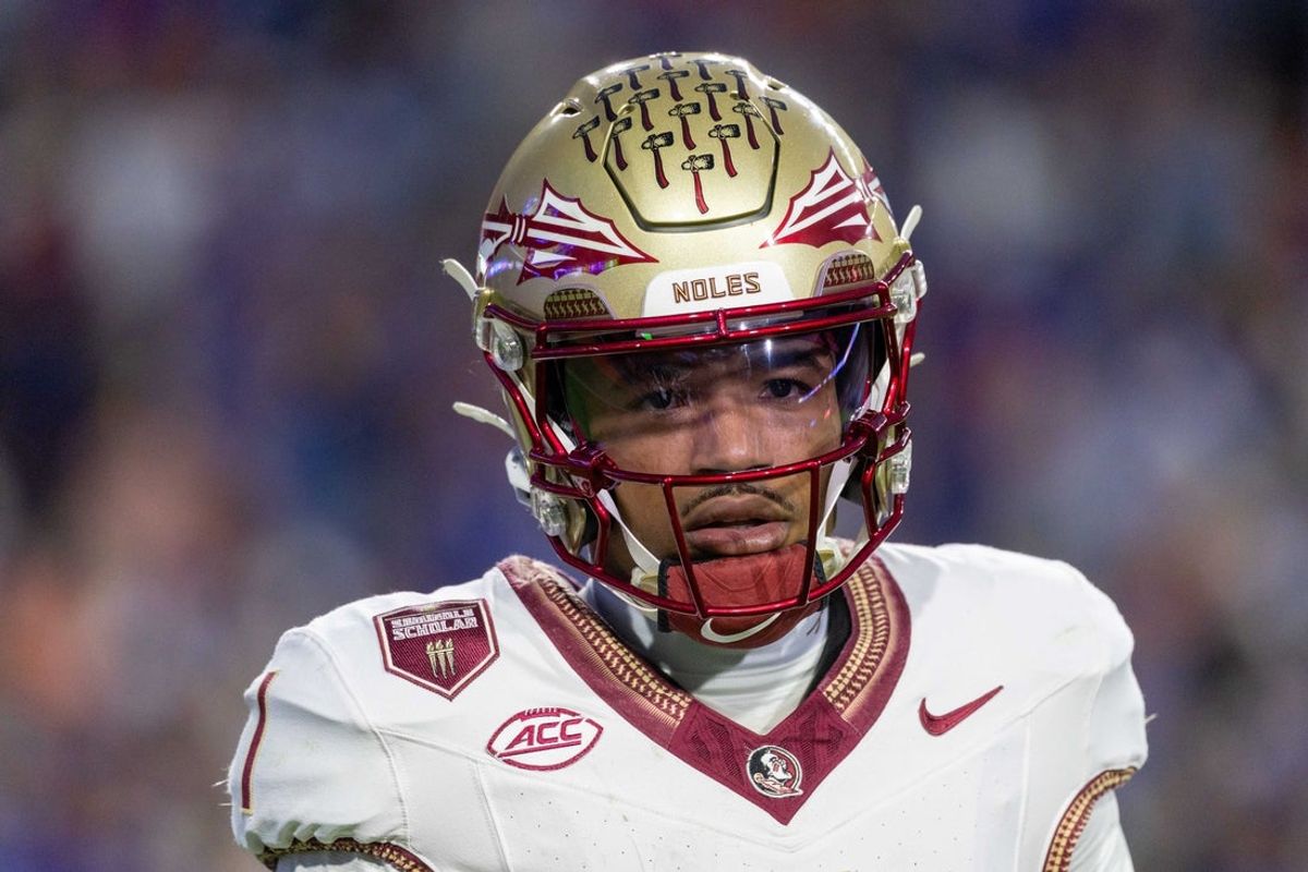 Nov 29, 2025; Gainesville, Florida, USA; Florida State Seminoles quarterback Tommy Castellanos (1) during the second quarter against the Florida Gators at Ben Hill Griffin Stadium. Mandatory Credit: Bob Kupbens-Imagn Images