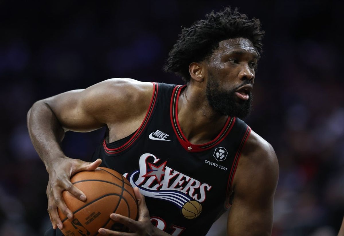 Dec 4, 2025; Philadelphia, Pennsylvania, USA; Philadelphia 76ers center Joel Embiid (21) controls the ball against the Golden State Warriors during the second quarter at Xfinity Mobile Arena. Mandatory Credit: Bill Streicher-Imagn Images